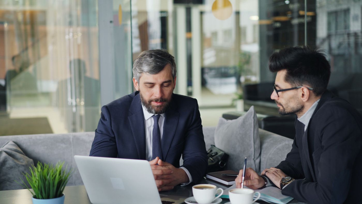 IT consultants reviewing a technology roadmap together